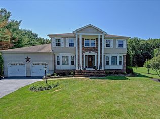 59 W Canadian Woods Rd, Manalapan, NJ 07726