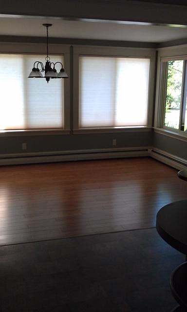 View of sun room/dining area. Deck is outside these windows.