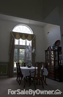 Formal Dining Room
						:
						Formal Dining room with 16' ceiling, wainscoting and crystal chandelier.