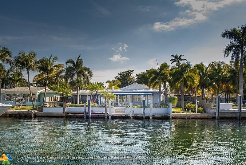 Waterfront view of 1649 SE 12th Court, overlooking Lauderdale Yacht Club and views to the intracoastal. Note this canal has a li