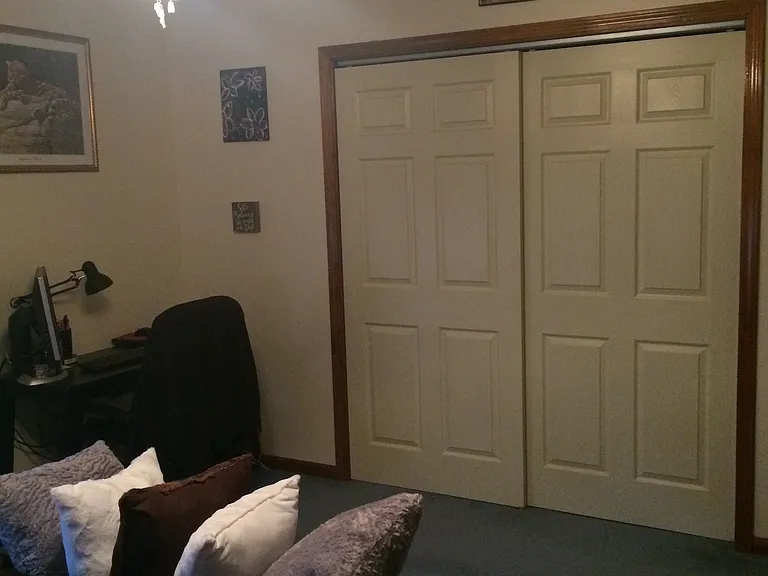 Master bedroom, before carpet was removed.