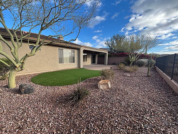 From view fencw back to house patio & grass area