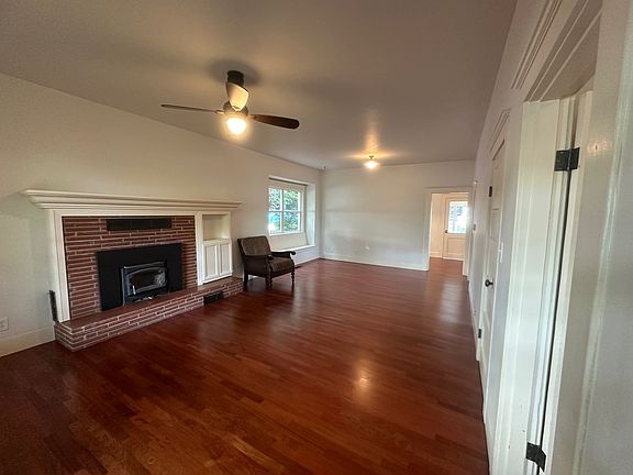 Main living area with wood stove