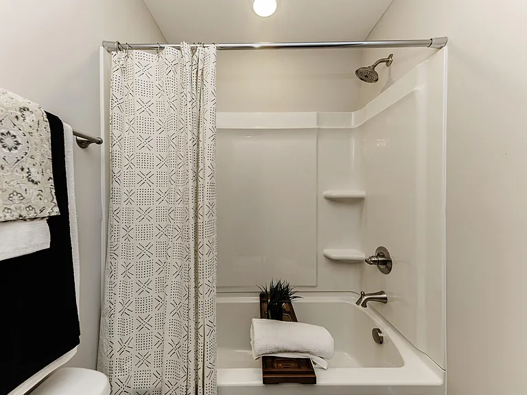 Bright bathroom with bathtub