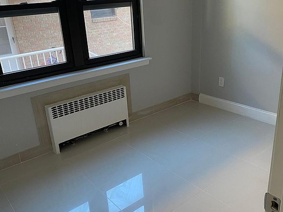 4th image of 40-12 209th St