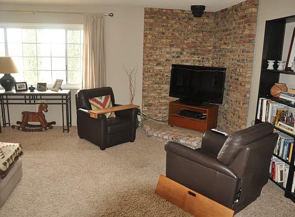 Livingroom TV area, prior renter's furnishings