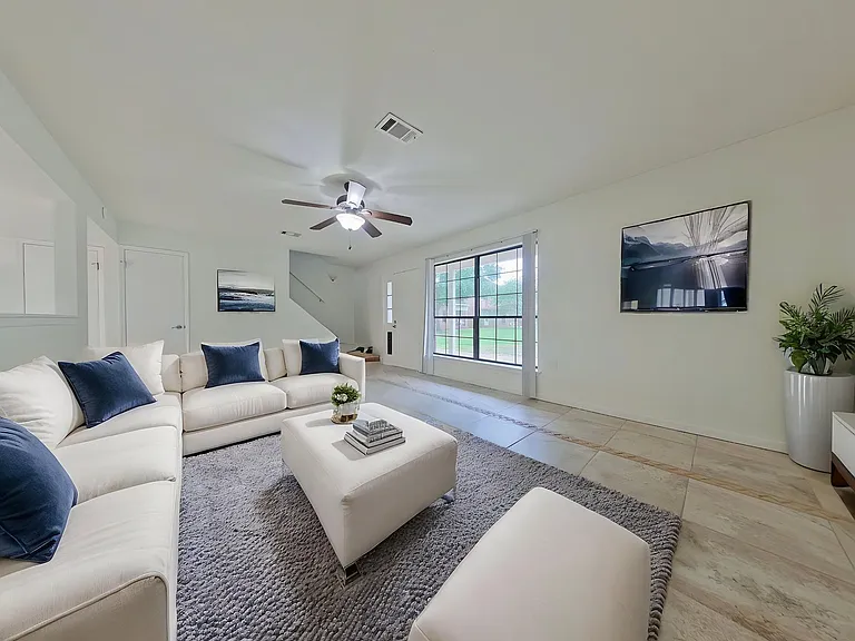 5-web-or-mls-3 Living Area virtually staged_05122026