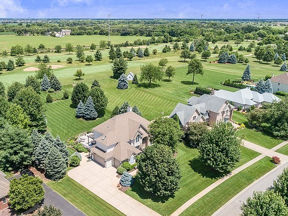 Beautifully landscaped~Side load 3-car garage w/over sized concrete driveway~Sprinkler system for bo