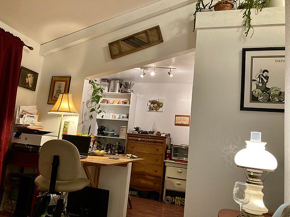 Office or dining area with table out.