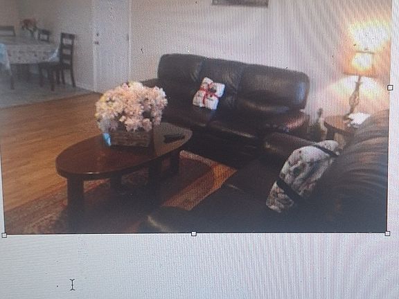 This is a partial view of the living room and kitchen.