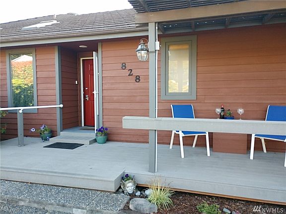 Front porch for relaxing and watching the birds in the high bird house at the street. Otherwise there's sitting on the View deck. Motion detector lighting aids multiple sections of driveway.