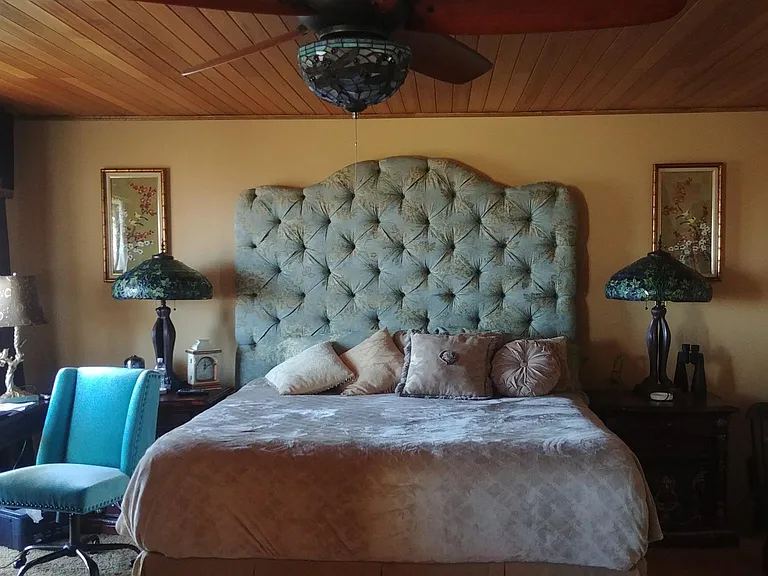 Master bedroom with a king size bed Mountain View's