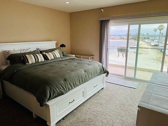 Master bedroom with balcony access