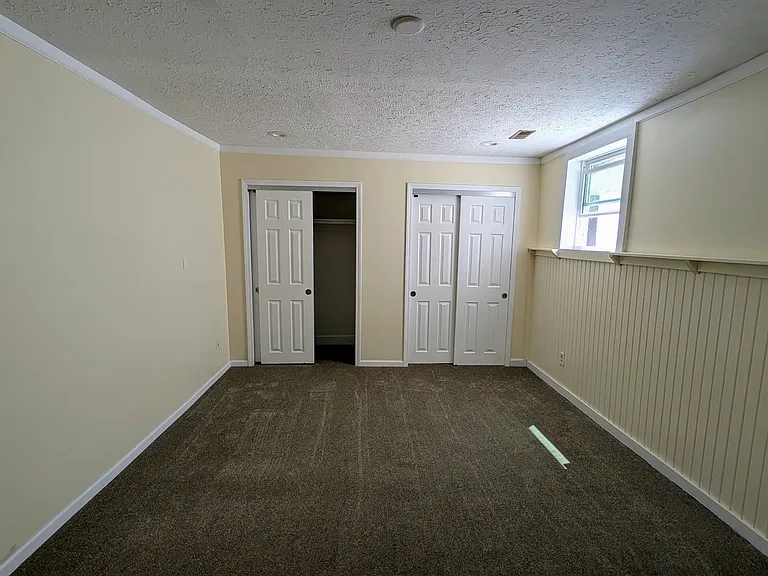 Spacious and freshly updated, the master suite offers double closets and a cozy layout for ultimate comfort.