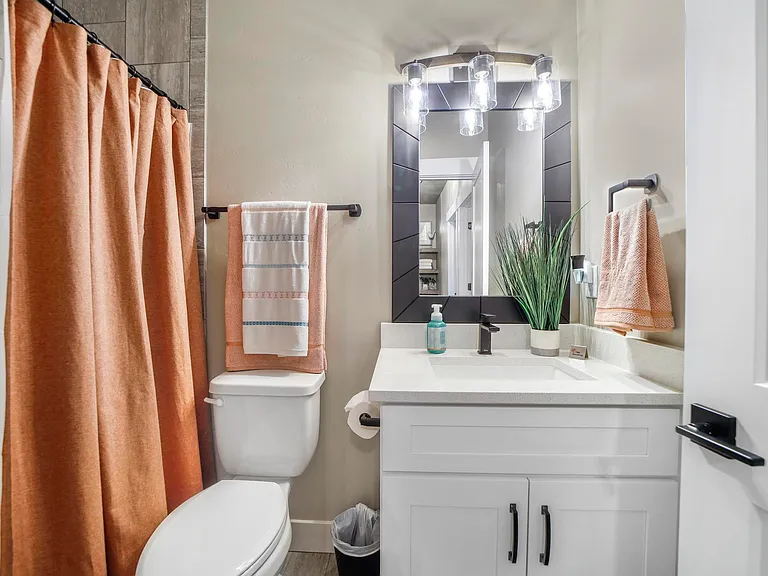 Bathroom #3 With Single Vanity, Custom Tile Bathtub/Shower