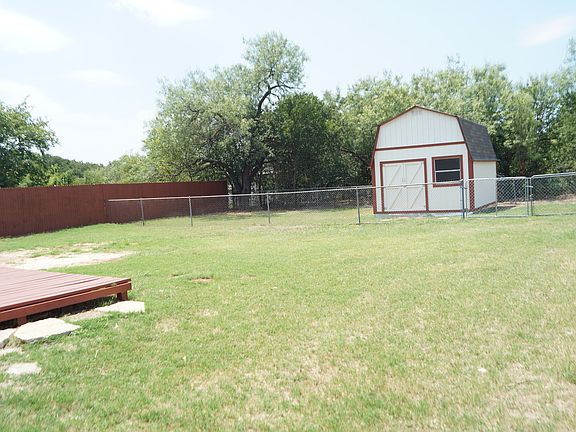 Large Fenced In Backyard with Shed