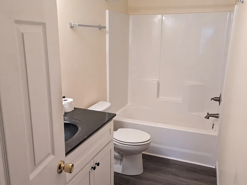 Bath with linen cabinet