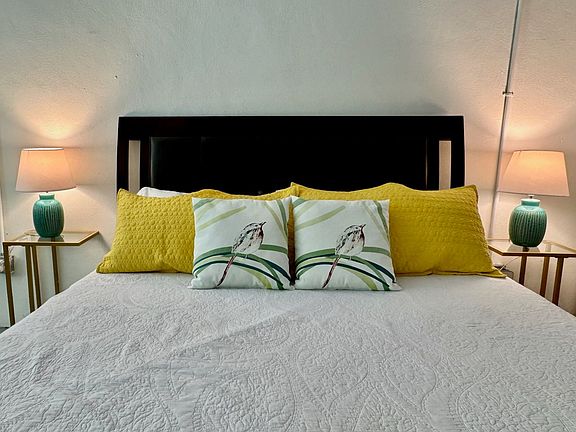 King Sized relaxation on a cedar wood bed frame w/ storage drawers!