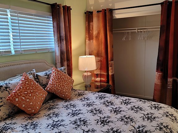 Spacious wardrobe closet & separate wall closet for hanging clothes.
1 armoire for hanging clothes and storage.
2 chests of drawers for storage.