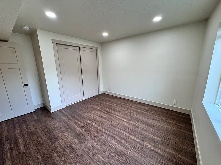 Comfortable third bedroom ideal for guests, kids, or a home office.