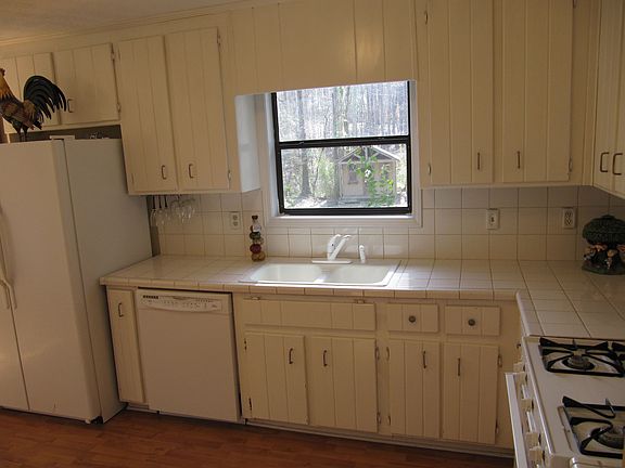 Window at kitchen sink has great view of backyard