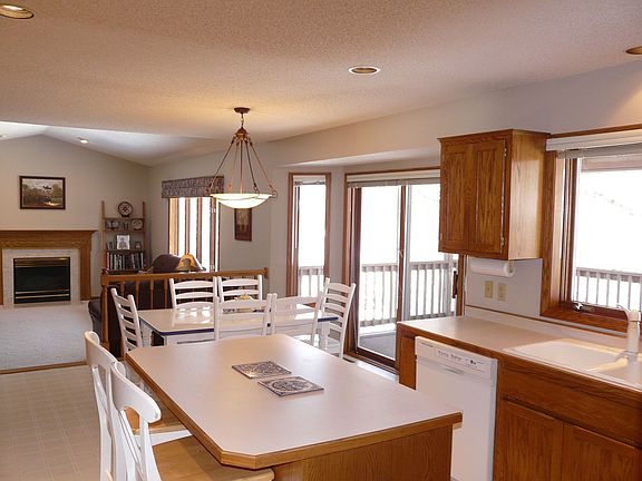 Kitchen faces large suken family room