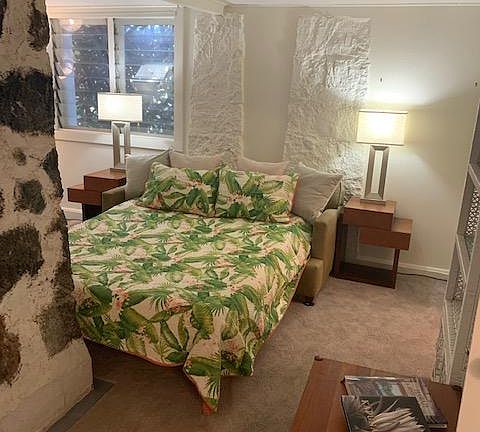 The living room sofa will pull out to a queen size sleeper.