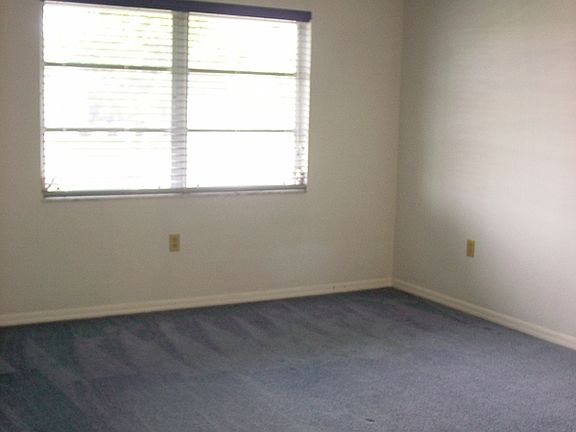 Master with water views, walk-in closet & stairs to HUGE floored attic