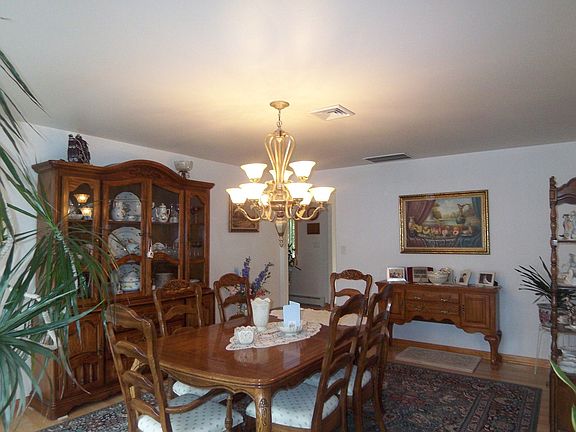 Formal DR - Hardwood flooring, large enough for entertaining