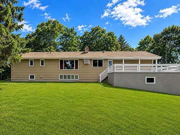 5th image of 8750 Queensland Ln N