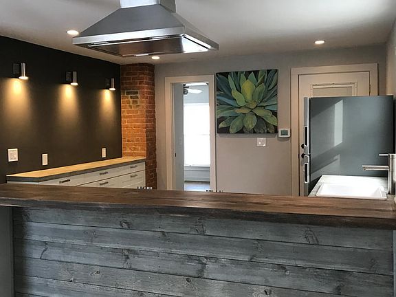 open floor kitchen with breakfast bar