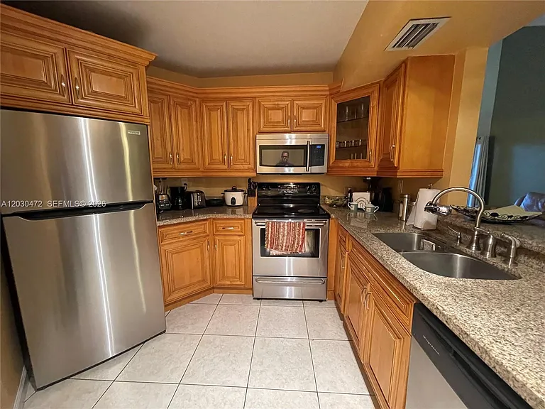9711 Fontainebleau Blvd #D203 — Photo 9