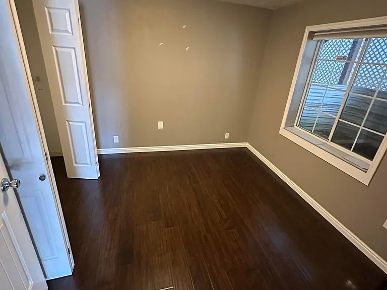 Bedroom can accommodate queen size bed, two night stands and dresser.