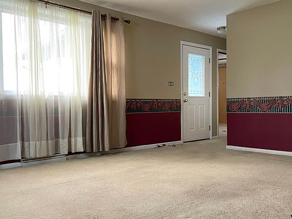 Living room- carpet will be hardwood floor