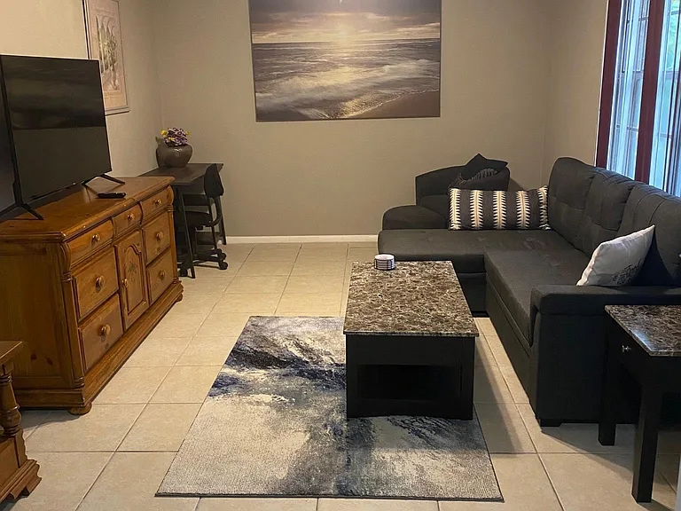 Den/ office w/ desk and sofa bed