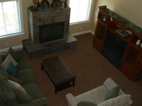Large, open family room with slate fireplace