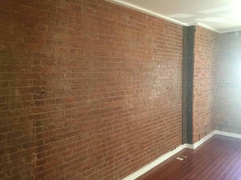 Exposed brick entire length of apt