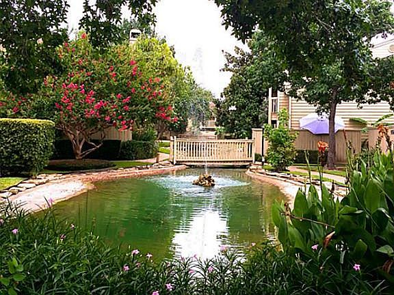 Lush landscape and fish pond. Perfect for after meal walking...