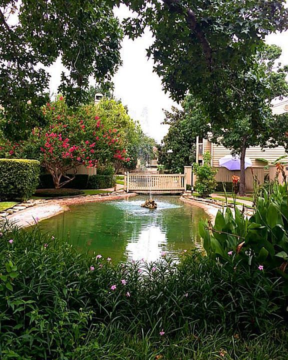 Lush landscape and fish pond. Perfect for after meal walking...