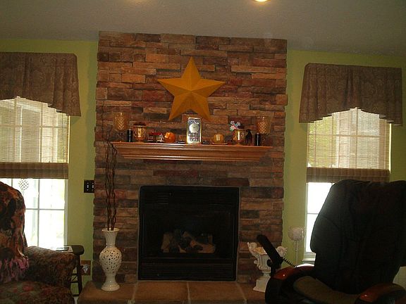 full wall stone gas fireplace