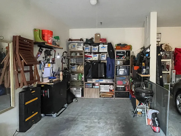 One car garage with plenty of storage