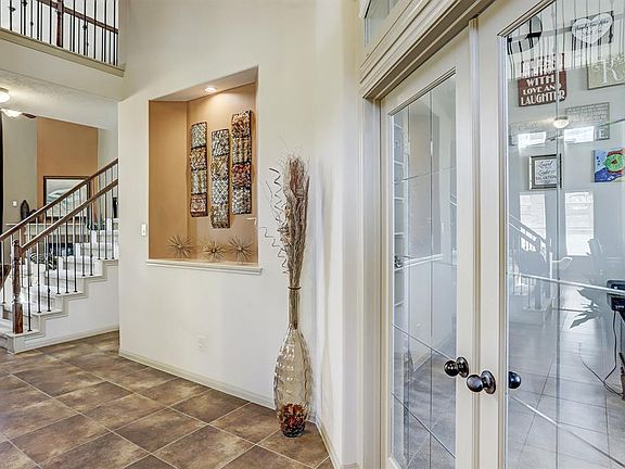 Open the front door and enter this lovely home. Study is pictured to the right.
