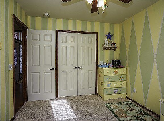 Secondary bedroom with large closet