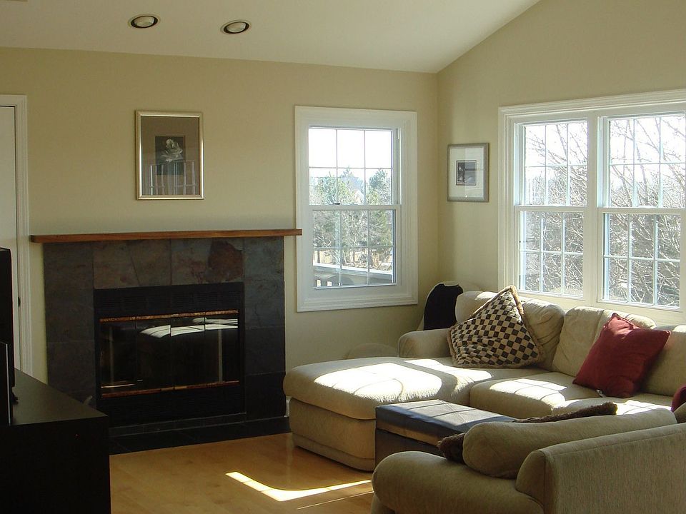The open floorplan and skylights let plenty of light into the living room.
