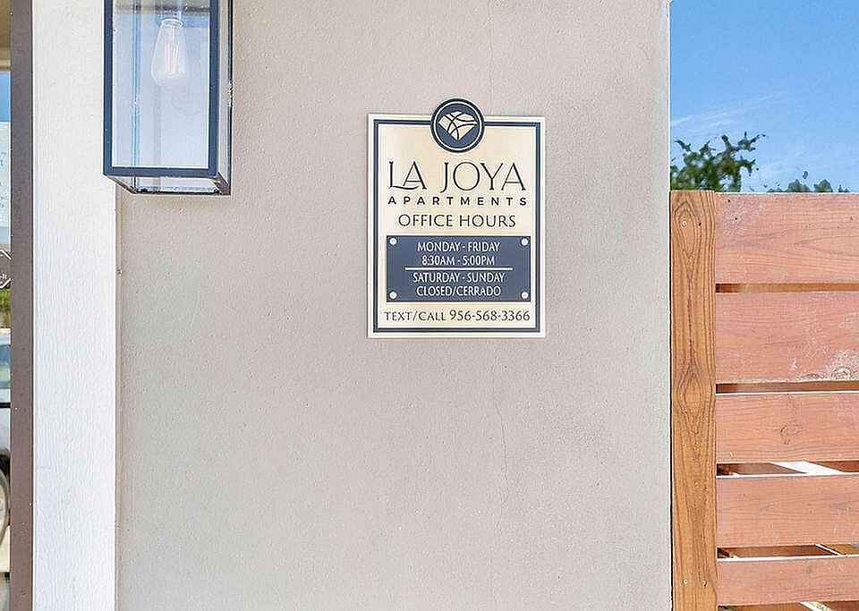 La Joya Apartments in Laredo, Texas, featuring office hours and contact information for inquiries