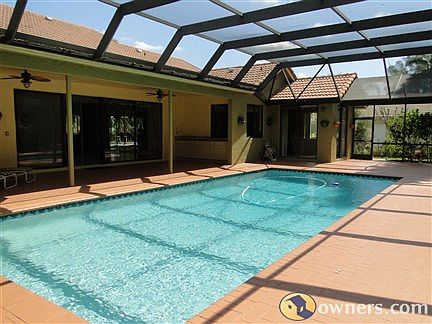 View from side of pool to patio
