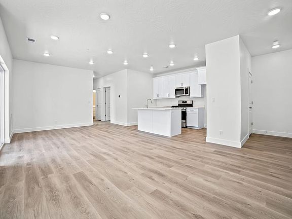 Great Room Kitchen Photo not representational of selections, only the floor plan. Contact agent f