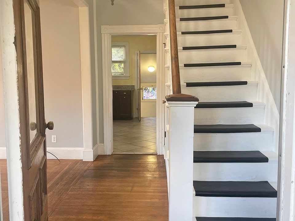 Hardwood floors and bright sunlight welcome you home