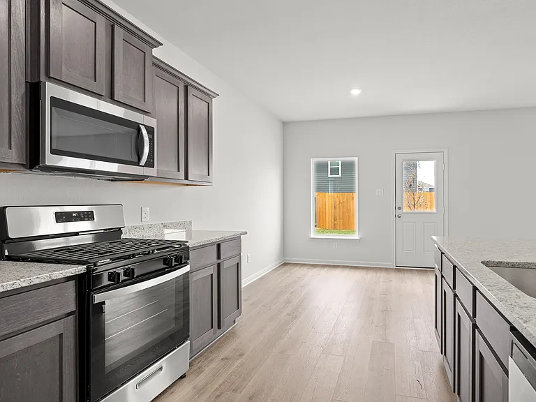The kitchens have designer wood cabinetry.