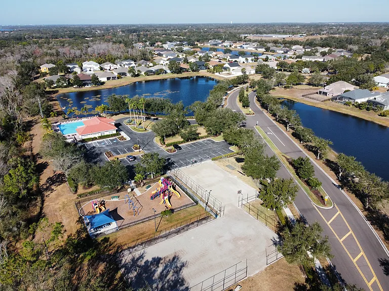 Community area with basketball and tennis court rebuilds underway